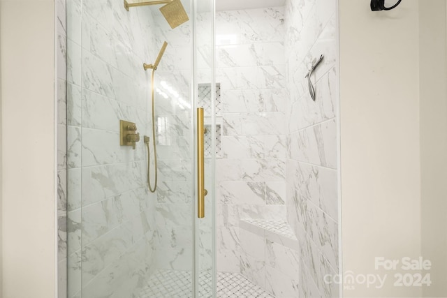 bathroom featuring an enclosed shower