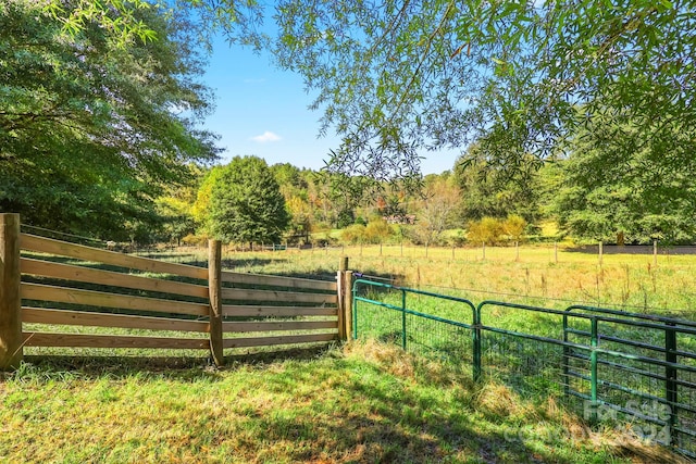 view of gate featuring a rural view