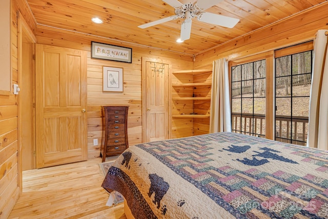 bedroom with wooden walls, ceiling fan, wood ceiling, recessed lighting, and wood finished floors