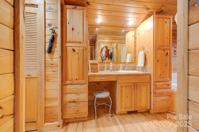 bathroom featuring recessed lighting, wood ceiling, vanity, and hardwood / wood-style floors
