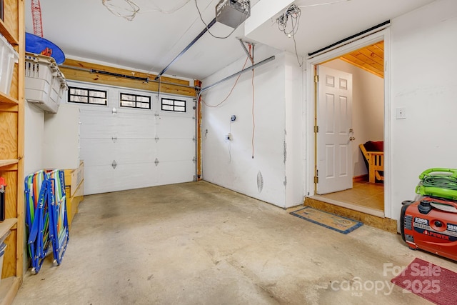 garage featuring a garage door opener
