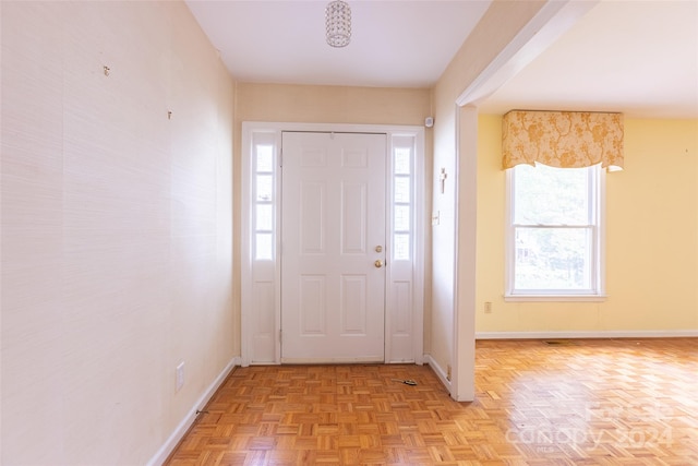 entrance foyer featuring light parquet flooring