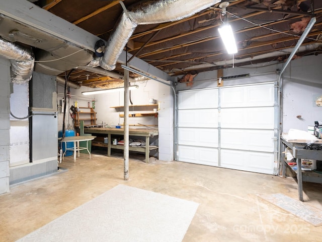 garage with a workshop area