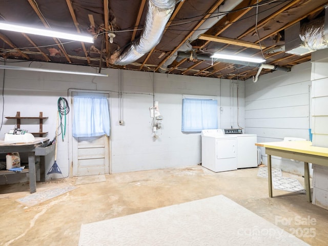 basement featuring washer and clothes dryer