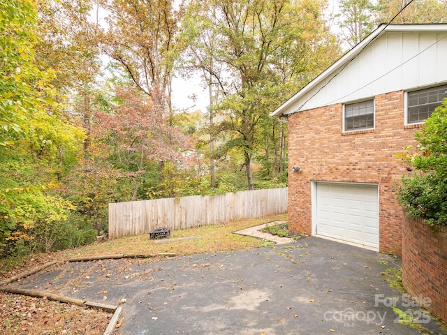 view of patio with a garage