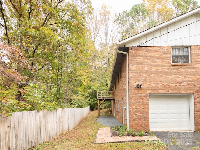 view of home's exterior with a garage