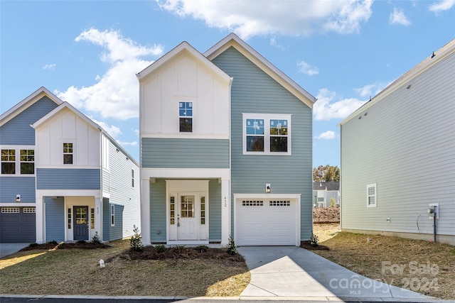 view of front of home with a garage