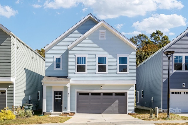 view of front of property with a garage