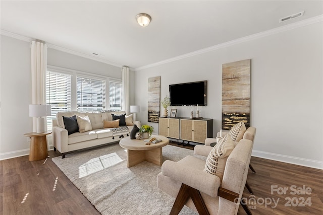 living room with crown molding and dark hardwood / wood-style flooring