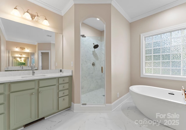 bathroom featuring crown molding, vanity, and independent shower and bath