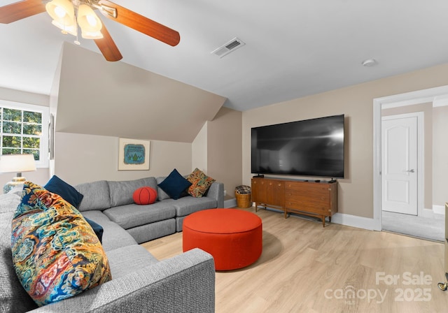 living room featuring light wood-type flooring and ceiling fan