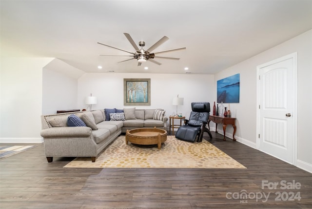 living room with ceiling fan and hardwood / wood-style flooring