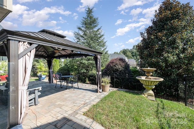 view of yard featuring a gazebo and a patio