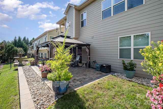 exterior space featuring a gazebo and a patio area