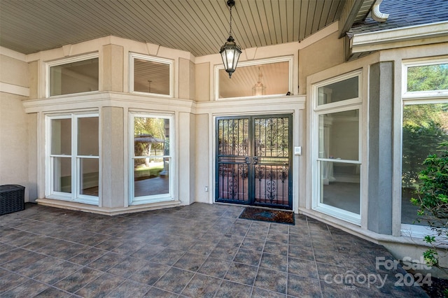 entrance to property with a patio