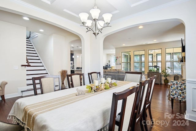 dining space featuring crown molding and dark hardwood / wood-style floors