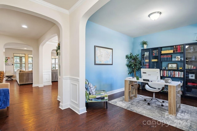 office space with ornamental molding and dark hardwood / wood-style flooring