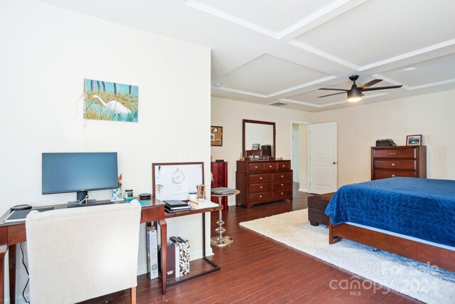 bedroom featuring ceiling fan, dark hardwood / wood-style flooring, and coffered ceiling