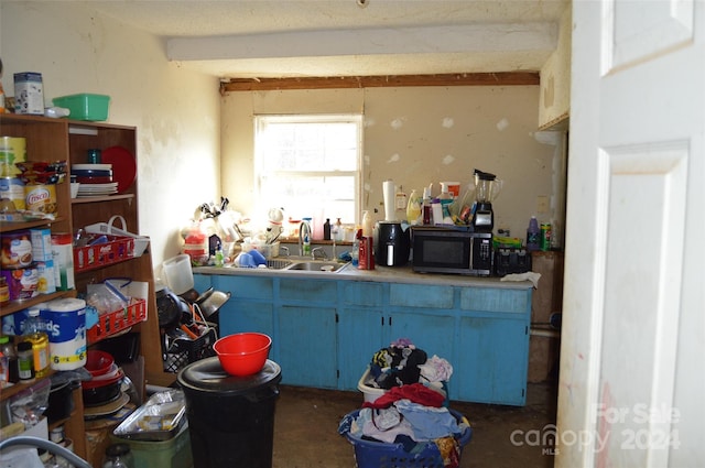 kitchen featuring blue cabinets