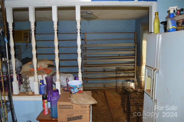 room details featuring white refrigerator with ice dispenser