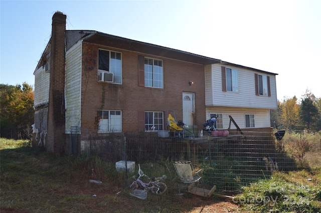 raised ranch featuring cooling unit