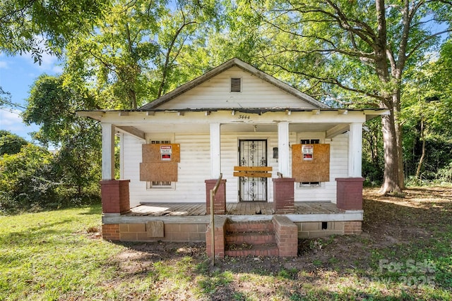 bungalow-style house featuring covered porch