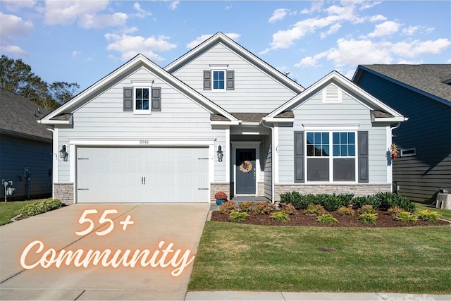 craftsman-style home featuring a front lawn and a garage