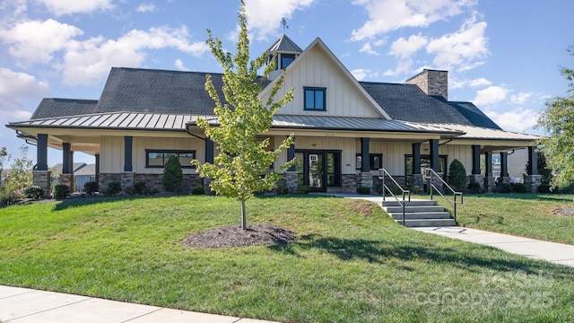 view of front of house featuring a porch and a front yard