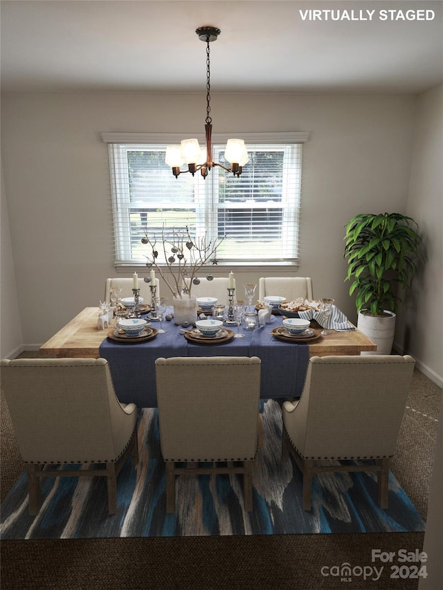 dining area featuring an inviting chandelier and a wealth of natural light