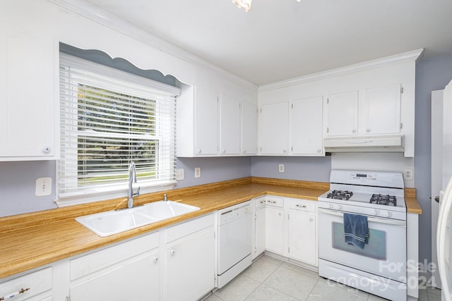 kitchen with light tile patterned floors, sink, white appliances, white cabinetry, and crown molding