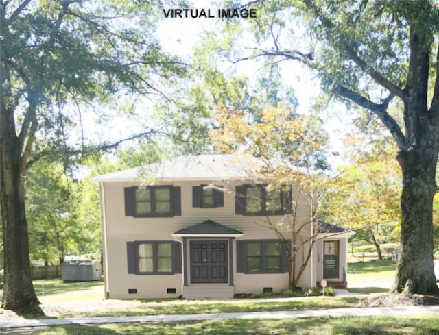 colonial house featuring crawl space, a front lawn, and entry steps