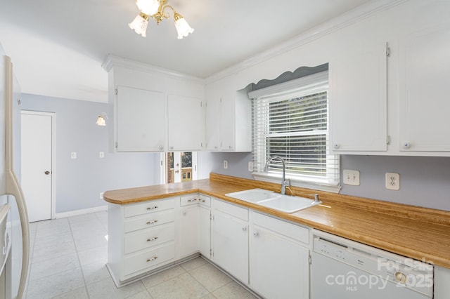 kitchen with white cabinets, dishwasher, a peninsula, and a sink