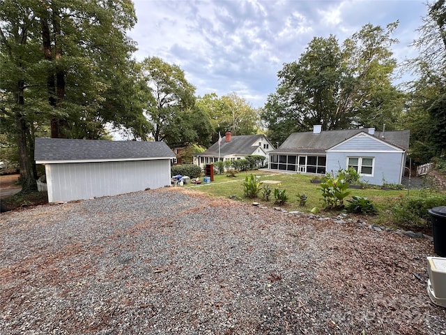 exterior space with a storage shed