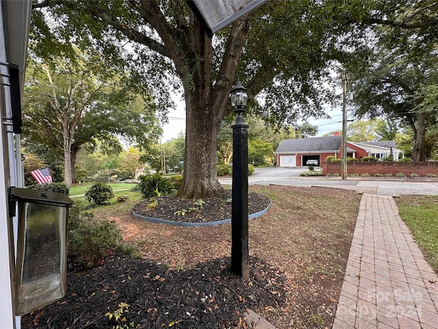 view of yard featuring a garage