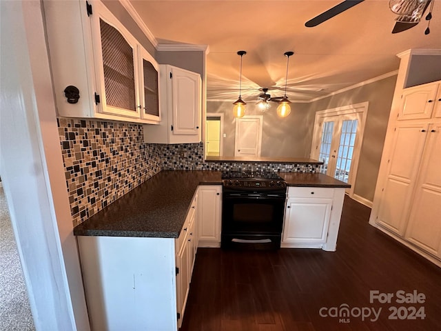 kitchen featuring decorative backsplash, dark hardwood / wood-style floors, white cabinets, ornamental molding, and black range with electric stovetop