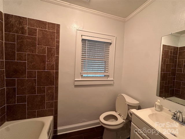 full bathroom featuring crown molding, tiled shower / bath, vanity, and toilet