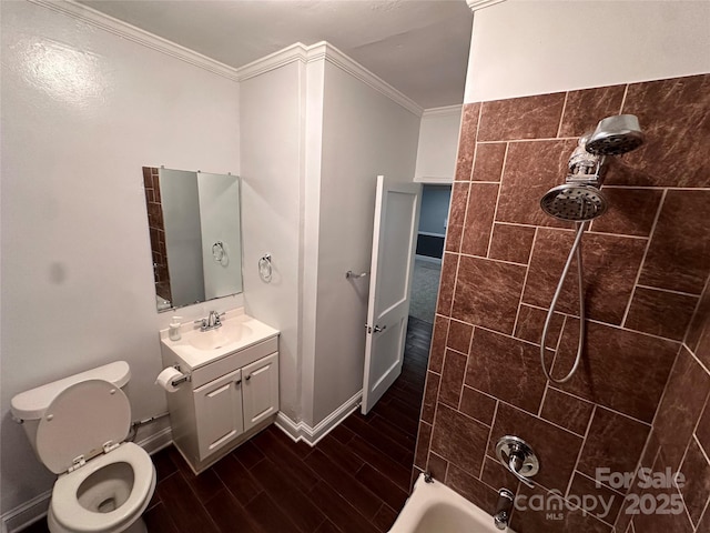 bathroom featuring crown molding, toilet, wood finished floors, vanity, and  shower combination