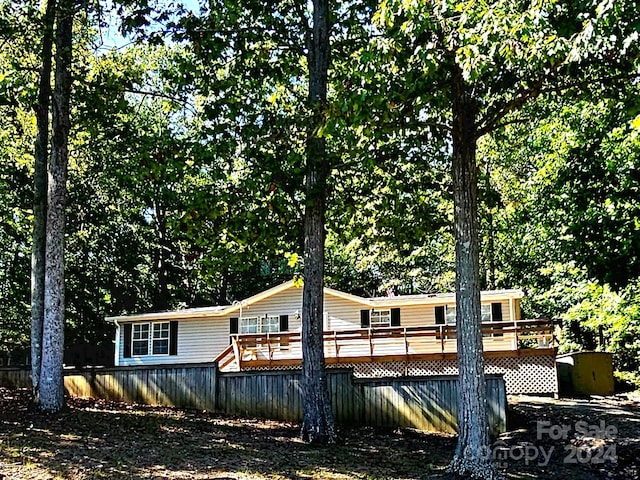 back of property with a deck