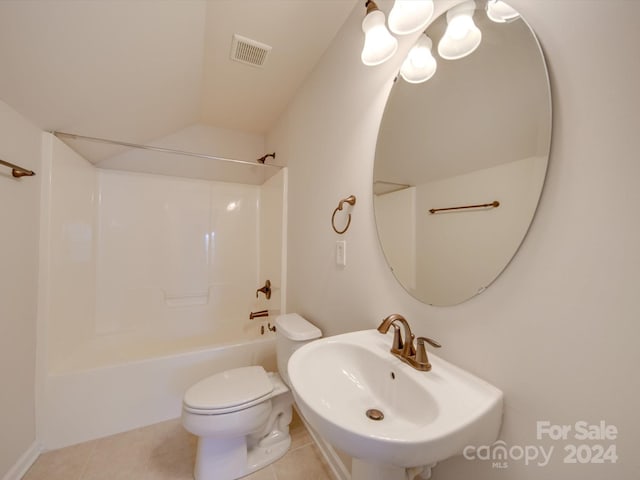 full bathroom with toilet, tile patterned floors, sink, and tub / shower combination