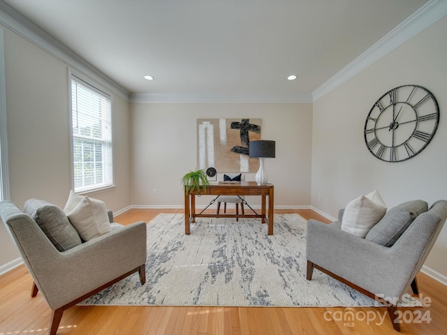 office space with ornamental molding and hardwood / wood-style floors