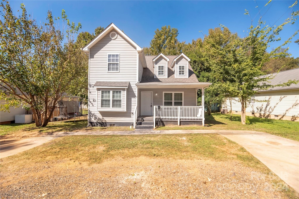 view of front of home with a front lawn and a porch