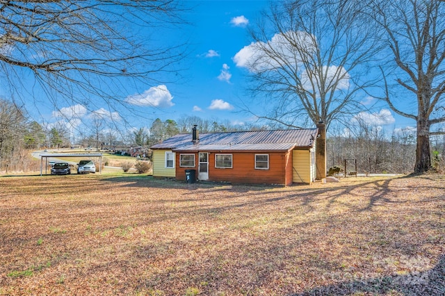 exterior space featuring a front lawn