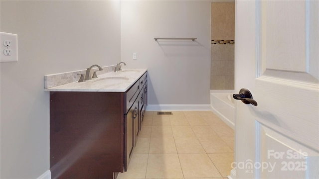 bathroom featuring tile patterned floors and vanity