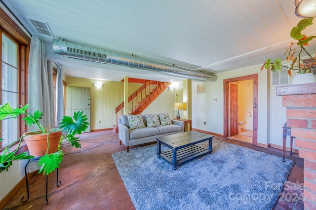 living room with concrete floors