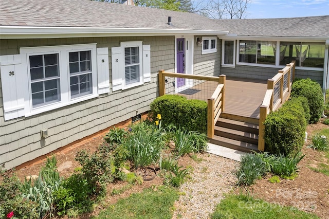 139 Neely Rd, Brevard, NC 28712 - view of exterior entry featuring a deck and a shingled roof