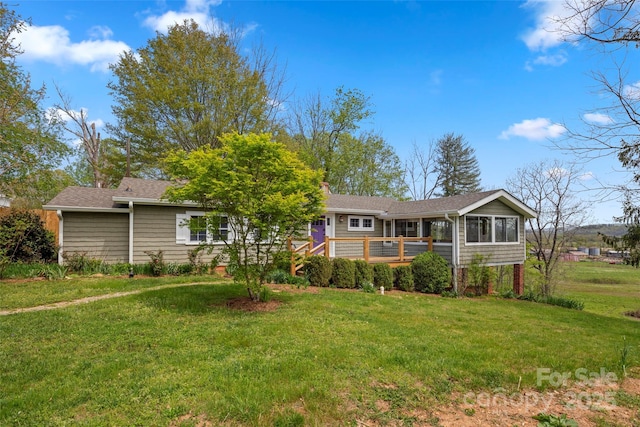 139 Neely Rd, Brevard, NC 28712 - back of property featuring a chimney, a yard, and a deck