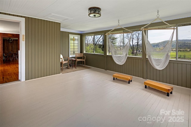 139 Neely Rd, Brevard, NC 28712 - sunroom featuring plenty of natural light, hardwood / wood-style flooring, and wooden walls