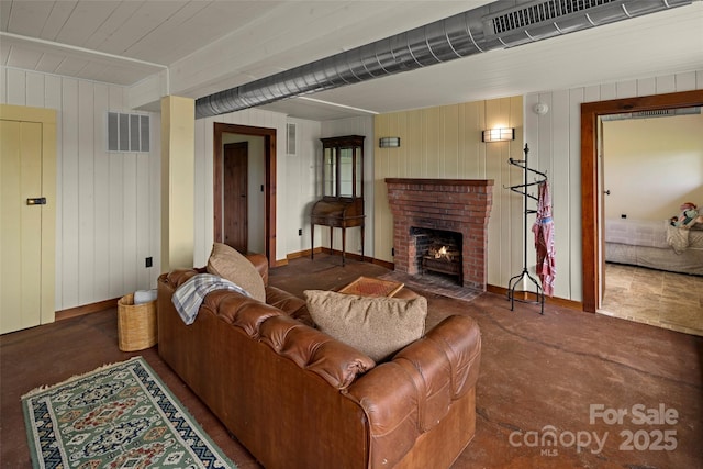 139 Neely Rd, Brevard, NC 28712 - living room with wooden walls, visible vents, and a fireplace