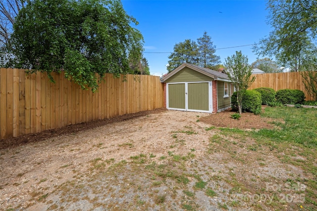 139 Neely Rd, Brevard, NC 28712 - view of yard with a fenced backyard, an outbuilding, and a storage shed