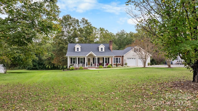 cape cod house featuring a front yard, a garage, and a porch